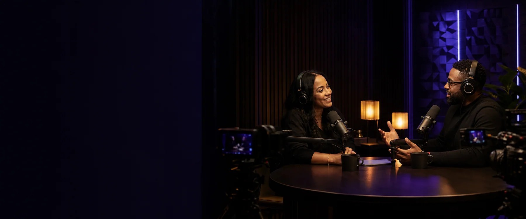 Podcast hosts having a conversation in a premium studio